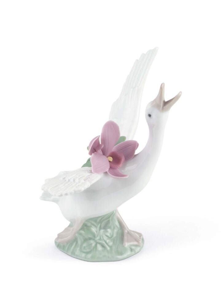 Running duck with pink orchid in Lladró